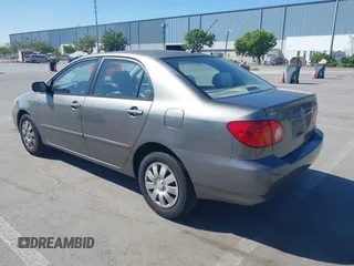 2004 Toyota Corolla CE with VIN 1NXBR32E64Z303089, listed as a IAAI auction lot 42147550 with 232,062 mi miles. Bid and sale history available at carsss.com. Image 3.