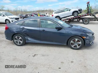 2019 Honda Civic LX with VIN 2HGFC2F61KH564474, listed as a IAAI auction lot 42156385 with 239,694 mi miles and . Bid and sale history available at DreamBid. Image 13.