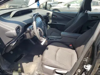 2021 Toyota Prius L Eco with VIN JTDKAMFU6M3150108, listed as a Copart auction lot 53690385 with 105,765 mi miles and Salvage Title. Bid and sale history available at carsss.com. Image 7.