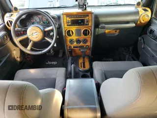 2008 Jeep Wrangler Unlimited X with VIN 1J4GB39168L649280, listed as a Copart auction lot 81379354 with 161,365 mi miles and Salvage Title. Bid and sale history available at DreamBid. Image 8.