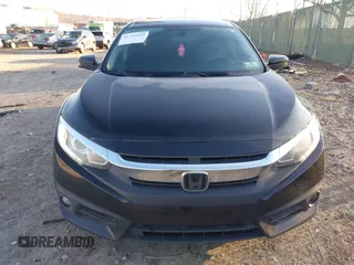 2018 Honda Civic EX with VIN 2HGFC2F7XJH509433, listed as a IAAI auction lot 41757844 with 177,263 mi miles and . Bid and sale history available at DreamBid. Image 12.