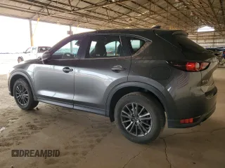 2020 Mazda CX-5 Touring with VIN JM3KFACM6L0804410, listed as a Copart auction lot 51009465 with 55,498 mi miles and Salvage Title. Bid and sale history available at carsss.com. Image 2.