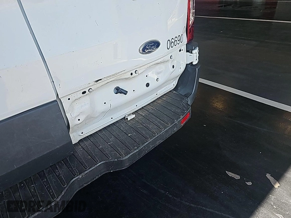 2016 Ford Transit Cargo with VIN 1FTYE1ZM0GKB06690, listed as a IAAI auction lot 42677893 with 295,974 mi miles and . Bid and sale history available at DreamBid. Image 3.