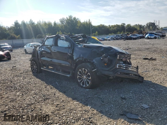 2023 GMC Canyon 4WD Denali with VIN 1GTP6FEK6P1263009, listed as a Copart auction lot 71101004 with 0 mi miles and Salvage Title. Bid and sale history available at carsss.com. Image 4.