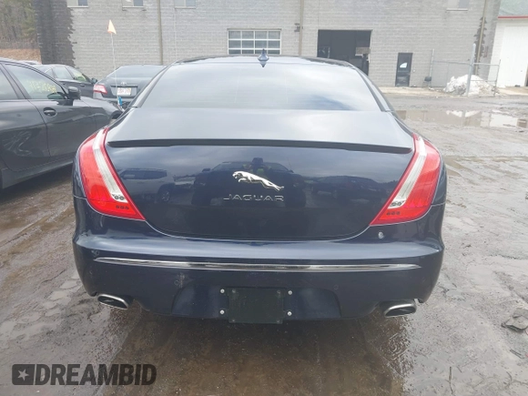 2015 Jaguar XJ Portfolio with VIN SAJWJ2GD0F8V83497, listed as a IAAI auction lot 41697285 with 52,311 mi miles and . Bid and sale history available at DreamBid. Image 16.