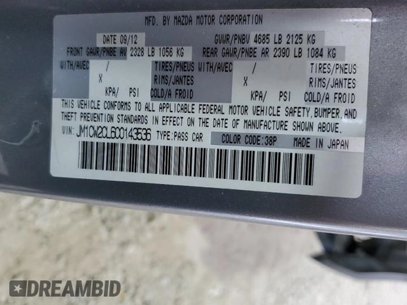 2012 Mazda 5 Touring z VIN JM1CW2CL6C0143536, wystawiony jako Copart lot #57579915 z przebiegiem 148 191 mil mil oraz Szkoda całkowita • Salvage title. Historia ofert i sprzedaży dostępna na DreamBid. Obrazek 13.