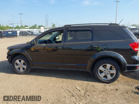 2012 Dodge Journey SXT z VIN 3C4PDCBG0CT290763, wystawiony jako IAAI lot #42553350 z przebiegiem 152 943 mil mil oraz . Historia ofert i sprzedaży dostępna na DreamBid. Obrazek 14.