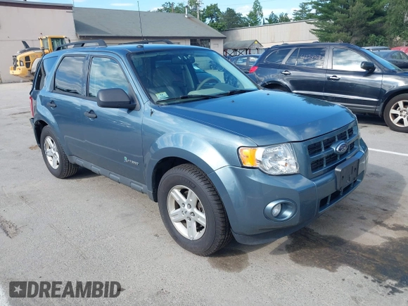 2011 Ford Escape Hybrid z VIN 1FMCU5K37BKB86287, wystawiony jako IAAI lot #42683149 z przebiegiem 151 972 mil mil oraz . Historia ofert i sprzedaży dostępna na DreamBid. Obrazek 1.