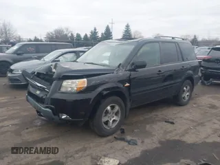 2007 Honda Pilot EX-L with VIN 2HKYF18507H526293, listed as a IAAI auction lot 41111983 with 101,170 mi miles. Bid and sale history available at carsss.com. Image 2.