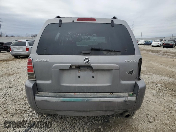 2007 Mercury Mariner Luxury with VIN 4M2YU91107KJ07772, listed as a Copart auction lot 42867545 with 128,235 mi miles and Salvage title. Bid and sale history available at DreamBid. Image 6.