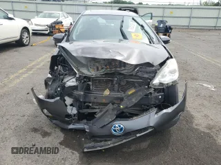 2014 Toyota Prius One z VIN JTDKDTB33E1066355, wystawiony jako Copart lot #58524285 z przebiegiem Nie podano mil oraz Szkoda całkowita • Salvage title. Historia ofert i sprzedaży dostępna na DreamBid. Obrazek 5.