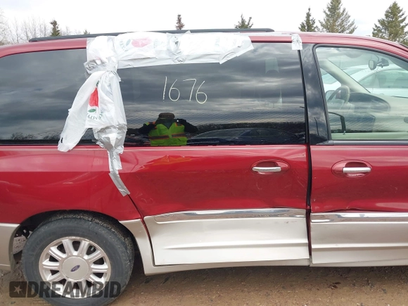 2003 Ford Windstar LTD with VIN 2FMDA58453BB87107, listed as a IAAI auction lot 42081676 with 164,638 mi miles and . Bid and sale history available at carsss.com. Image 14.
