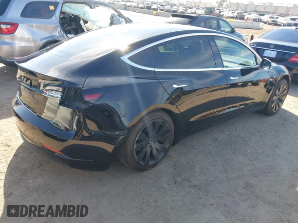 2018 Tesla Model 3 Long Range Battery with VIN 5YJ3E1EA0JF056979, listed as a IAAI auction lot 41865849 with 97,319 mi miles. Bid and sale history available at carsss.com. Image 4.