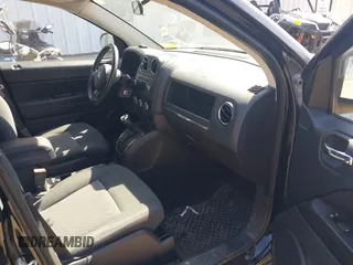 2012 Jeep Compass Latitude with VIN 1C4NJDEB2CD621760, listed as a IAAI auction lot 42123908 with 117,945 mi miles. Bid and sale history available at carsss.com. Image 5.
