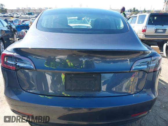 2022 Tesla Model 3 with VIN 5YJ3E1EA8NF241691, listed as a IAAI auction lot 41742584 with 70,375 mi miles and . Bid and sale history available at DreamBid. Image 16.