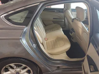 2014 Ford Fusion SE with VIN 1FA6P0HDXE5389873, listed as a IAAI auction lot 41976851 with 175,182 mi miles. Bid and sale history available at carsss.com. Image 8.