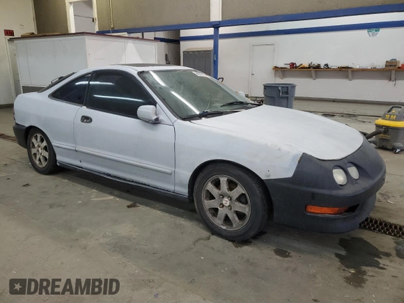 1998 Acura Integra LS with VIN JH4DC4359WS009556, listed as a Copart auction lot 84032334 with 244,851 mi miles and Salvage title. Bid and sale history available at DreamBid. Image 4.