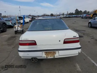 1991 Acura Integra with VIN JH4DB1669MS009690, listed as a Copart auction lot 42462585 with 300,660 mi miles and Salvage title. Bid and sale history available at DreamBid. Image 6.