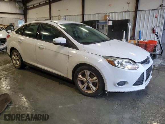 2014 Ford Focus SE with VIN 1FADP3F25EL449810, listed as a Copart auction lot 73174364 with 140,031 mi miles and Salvage Title. Bid and sale history available at DreamBid. Image 4.