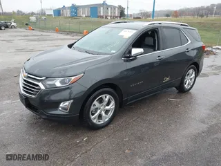 2021 Chevrolet Equinox Premier with VIN 2GNAXNEV2M6154439, listed as a IAAI auction lot 40876413 with 35,174 mi miles. Bid and sale history available at carsss.com. Image 2.