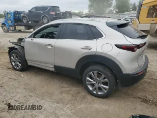 2023 Mazda CX-30 S Carbon Edition z VIN 3MVDMBCM2PM522361, wystawiony jako Copart lot #54751885 z przebiegiem 48 398 mil mil oraz Szkoda całkowita • Salvage title. Historia ofert i sprzedaży dostępna na DreamBid. Obrazek 2.
