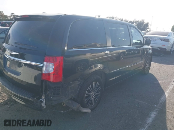 2014 Chrysler Town & Country S with VIN 2C4RC1HG7ER177874, listed as a IAAI auction lot 41725127 with 126,520 mi miles. Bid and sale history available at carsss.com. Image 4.