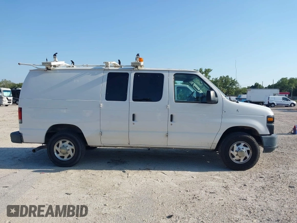 2012 Ford Econoline Cargo Commercial with VIN 1FTNE2EL2CDB10454, listed as a IAAI auction lot 41992574 with 210,118 mi miles and . Bid and sale history available at DreamBid. Image 13.