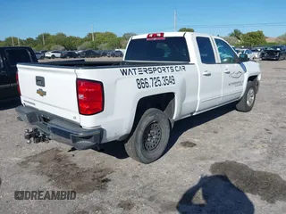 2018 Chevrolet Silverado 1500 LT with VIN 1GCRCREC1JZ153165, listed as a IAAI auction lot 41737258 with 130,475 mi miles and . Bid and sale history available at DreamBid. Image 4.
