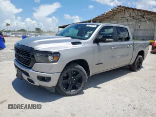2021 Ram 1500 Big Horn with VIN 1C6SRFFT5MN677273, listed as a Copart auction lot 62514815 with 49,259 mi miles and Salvage title. Bid and sale history available at DreamBid. Image 1.