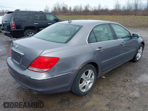 2006 Acura RL z VIN JH4KB165X6C006938, wystawiony jako IAAI lot #41936024 z przebiegiem 235 390 mil mil oraz . Historia ofert i sprzedaży dostępna na DreamBid. Obrazek 4.