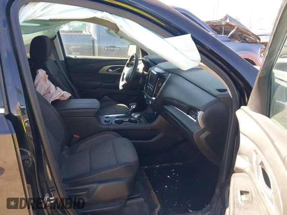 2021 Chevrolet Traverse LS with VIN 1GNERFKW8MJ101892, listed as a IAAI auction lot 41679026 with 48,694 mi miles and . Bid and sale history available at DreamBid. Image 5.