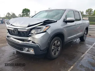 2019 Honda Ridgeline RTL-E with VIN 5FPYK3F72KB026100, listed as a IAAI auction lot 42205910 with 78,359 mi miles and . Bid and sale history available at DreamBid. Image 2.