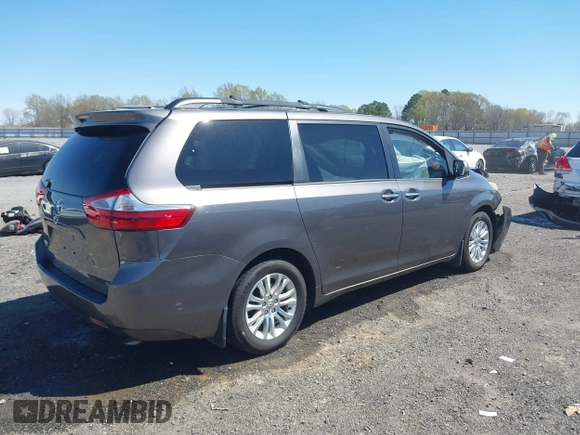 2015 Toyota Sienna XLE with VIN 5TDYK3DC4FS634937, listed as a IAAI auction lot 41869781 with 65,561 mi miles and . Bid and sale history available at carsss.com. Image 4.
