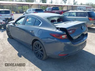 2023 Mazda 3 S Carbon Edition with VIN 3MZBPACM5PM376545, listed as a IAAI auction lot 42404054 with Not provided miles and . Bid and sale history available at DreamBid. Image 3.
