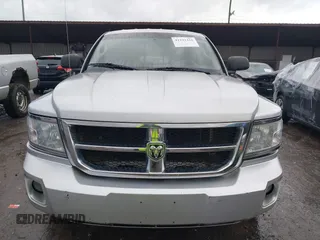 2008 Dodge Dakota SLT with VIN 1D7HW42KX8S560105, listed as a IAAI auction lot 41192410 with 99,097 mi miles and . Bid and sale history available at carsss.com. Image 6.