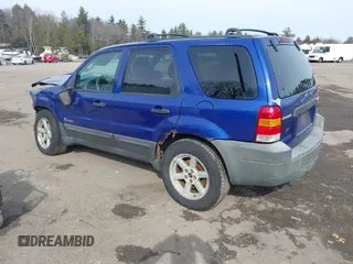 2005 Ford Escape Hybrid with VIN 1FMCU96HX5KC07148, listed as a IAAI auction lot 41741158 with 225,598 mi miles. Bid and sale history available at carsss.com. Image 3.