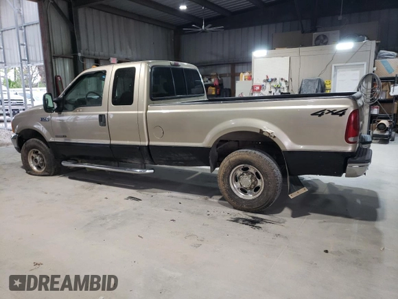 2001 Ford F-250 XL with VIN 1FTNX21F71EB01590, listed as a Copart auction lot 53720615 with 344,588 mi miles and Salvage Title. Bid and sale history available at DreamBid. Image 2.