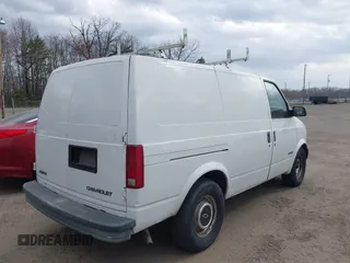 1999 Chevrolet Astro Cargo Van with VIN 1GCDM19W2XB168918, listed as a IAAI auction lot 41832476 with 262,495 mi miles. Bid and sale history available at carsss.com. Image 4.