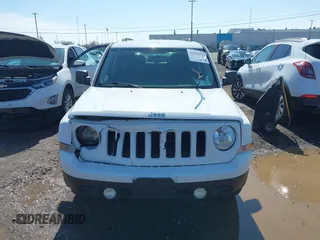 2014 Jeep Patriot Latitude with VIN 1C4NJPFA8ED550221, listed as a IAAI auction lot 41919419 with 185,386 mi miles and . Bid and sale history available at carsss.com. Image 12.