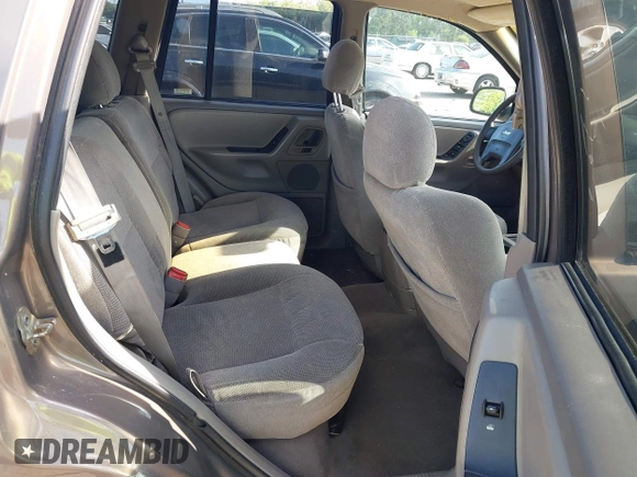 2001 Jeep Grand Cherokee Laredo with VIN 1J4GX48S91C559693, listed as a IAAI auction lot 42152103 with 152,713 mi miles and . Bid and sale history available at DreamBid. Image 8.