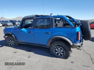 2021 Ford Bronco z VIN 1FMEE5DH6MLA74091, wystawiony jako Copart lot #46137495 z przebiegiem 54 780 mil mil oraz Szkoda całkowita • Salvage title. Historia ofert i sprzedaży dostępna na DreamBid. Obrazek 2.