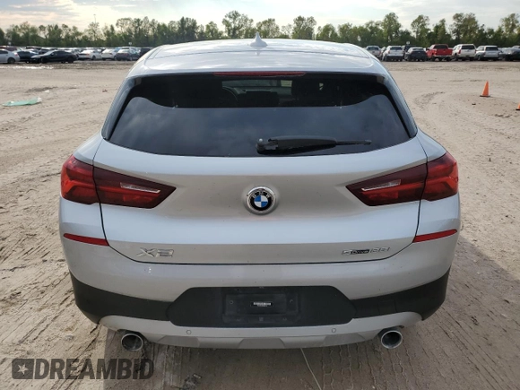 2022 BMW X2 sDrive28i with VIN WBXYH9C08N5U12160, listed as a Copart auction lot 74151464 with 59,362 mi miles and Clean Title. Bid and sale history available at carsss.com. Image 7.