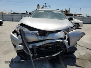 2017 Toyota RAV4 LE with VIN 2T3BFREV6HW658235, listed as a Copart auction lot 63409005 with 62,303 mi miles and Salvage title. Bid and sale history available at DreamBid. Image 5.