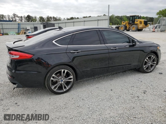 2019 Ford Fusion Titanium with VIN 3FA6P0D95KR184147, listed as a Copart auction lot 52968885 with 122,170 mi miles and Clean Title. Bid and sale history available at carsss.com. Image 3.