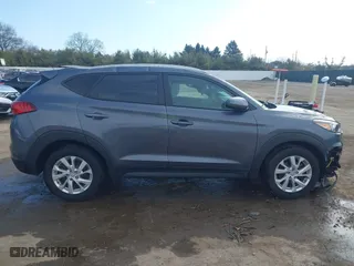 2019 Hyundai Tucson Value with VIN KM8J33A40KU999340, listed as a IAAI auction lot 41876380 with 52,752 mi miles. Bid and sale history available at carsss.com. Image 13.