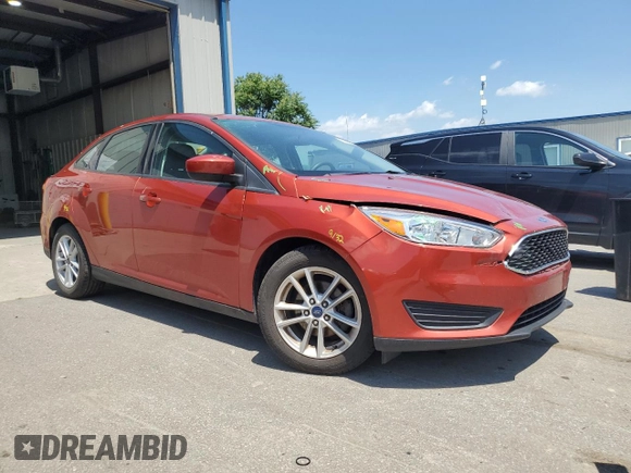 2018 Ford Focus SE z VIN 1FADP3F2XJL254750, wystawiony jako Copart lot #61907545 z przebiegiem 71 328 mil mil oraz Szkoda całkowita • Salvage title. Historia ofert i sprzedaży dostępna na DreamBid. Obrazek 4.