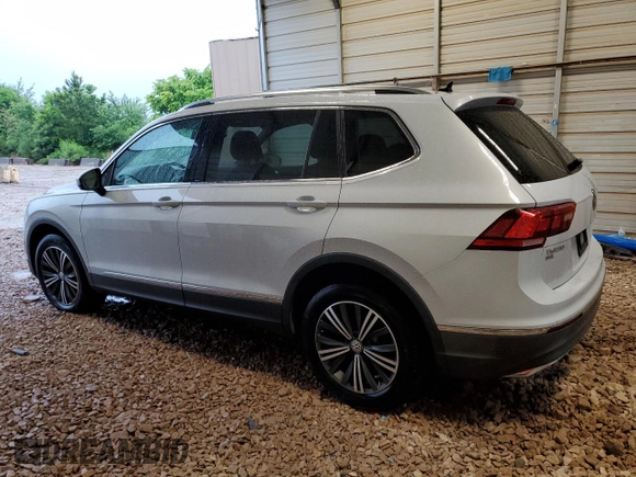 2018 Volkswagen Tiguan SEL z VIN 3VV2B7AX3JM009637, wystawiony jako Copart lot #59373325 z przebiegiem 148 046 mil mil oraz Szkoda całkowita • Salvage title. Historia ofert i sprzedaży dostępna na DreamBid. Obrazek 2.