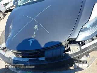 2022 Tesla Model 3 with VIN 5YJ3E1EAXNF326354, listed as a IAAI auction lot 41651872 with 27,922 mi miles and . Bid and sale history available at DreamBid. Image 13.