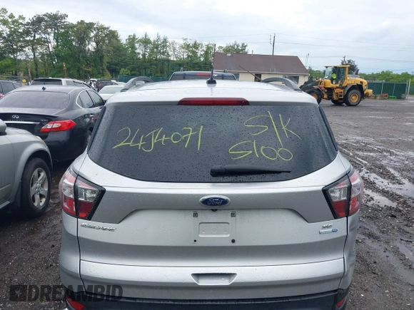 2018 Ford Escape SE with VIN 1FMCU9G99JUC41605, listed as a IAAI auction lot 39500946 with 114,032 mi miles. Bid and sale history available at carsss.com. Image 16.