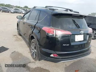 2017 Toyota RAV4 XLE with VIN 2T3WFREVXHW352608, listed as a IAAI auction lot 41921190 with 157,608 mi miles. Bid and sale history available at carsss.com. Image 3.